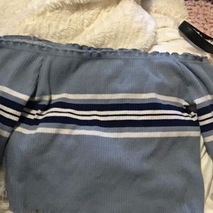 Blue off the shoulder shirt